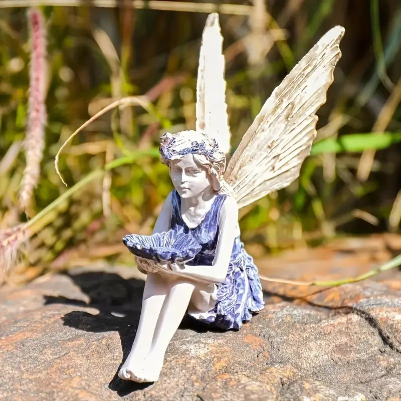 Statue de fée assise en résine Le Coin Vert