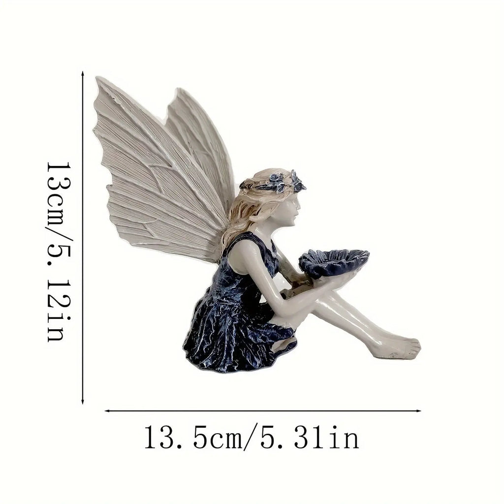 Statue de fée assise en résine Le Coin Vert